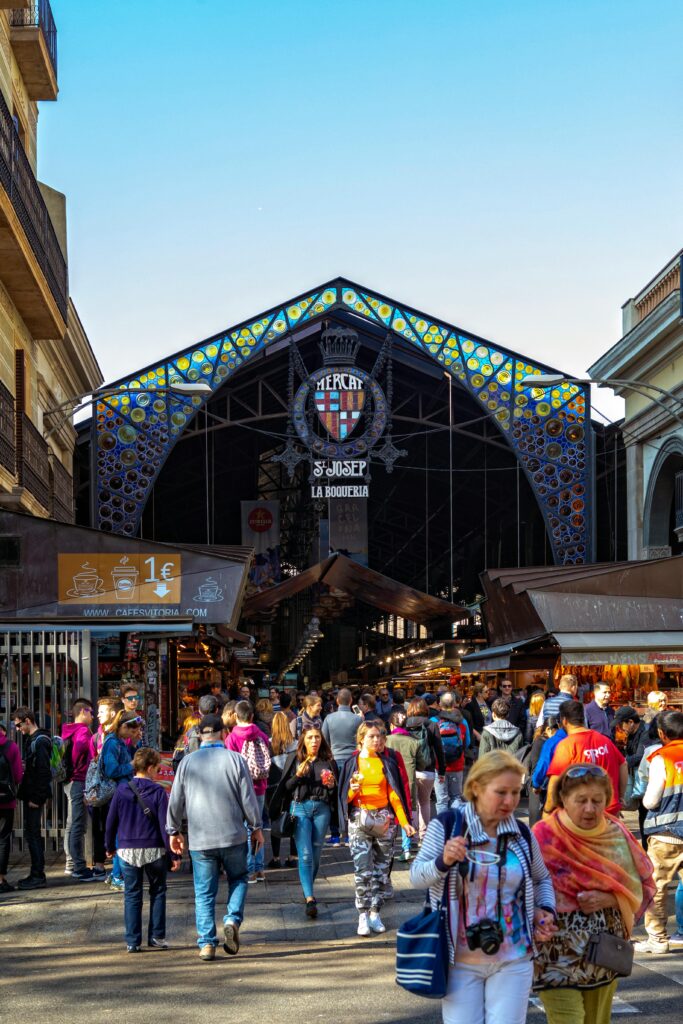 People Walking on Street Near a Famous Public Market